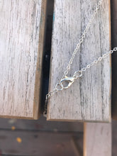 Load image into Gallery viewer, Long silver arrowhead lava bead essential oil diffuser necklace
